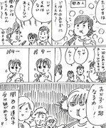 子供たちと漫画を描く漫画家